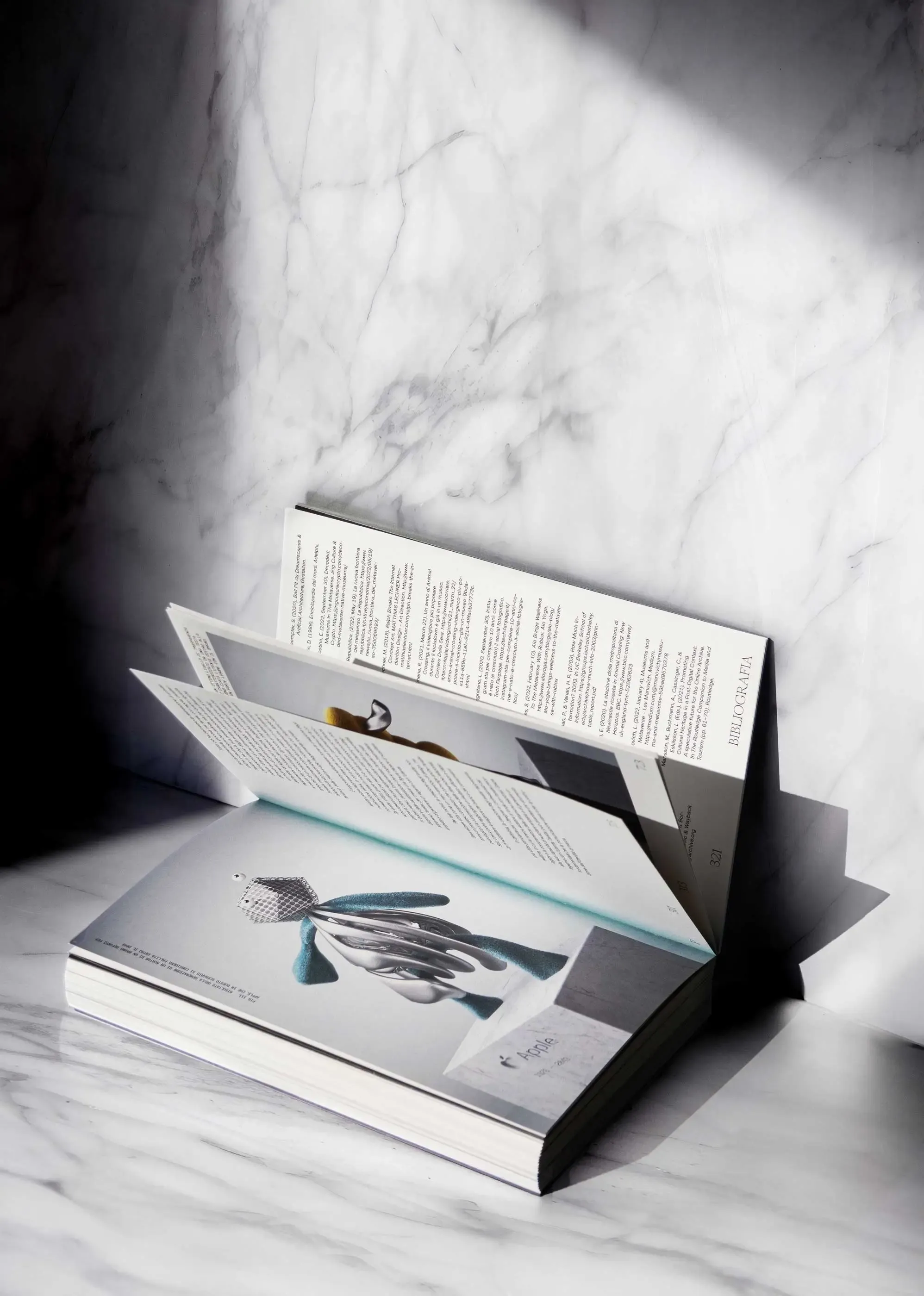 Spread from the printed thesis 'Beyond the Brand's Grave' showing a 3D-rendered avatar sculpture and critical text on brand nostalgia