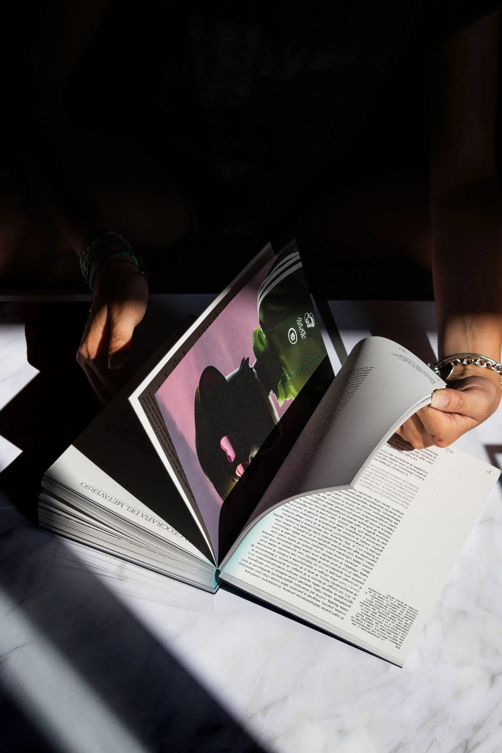 Interior spread of the thesis 'Beyond the Brand's Grave' showing a digital fashion image and essay pages on the aesthetics of the metaverse