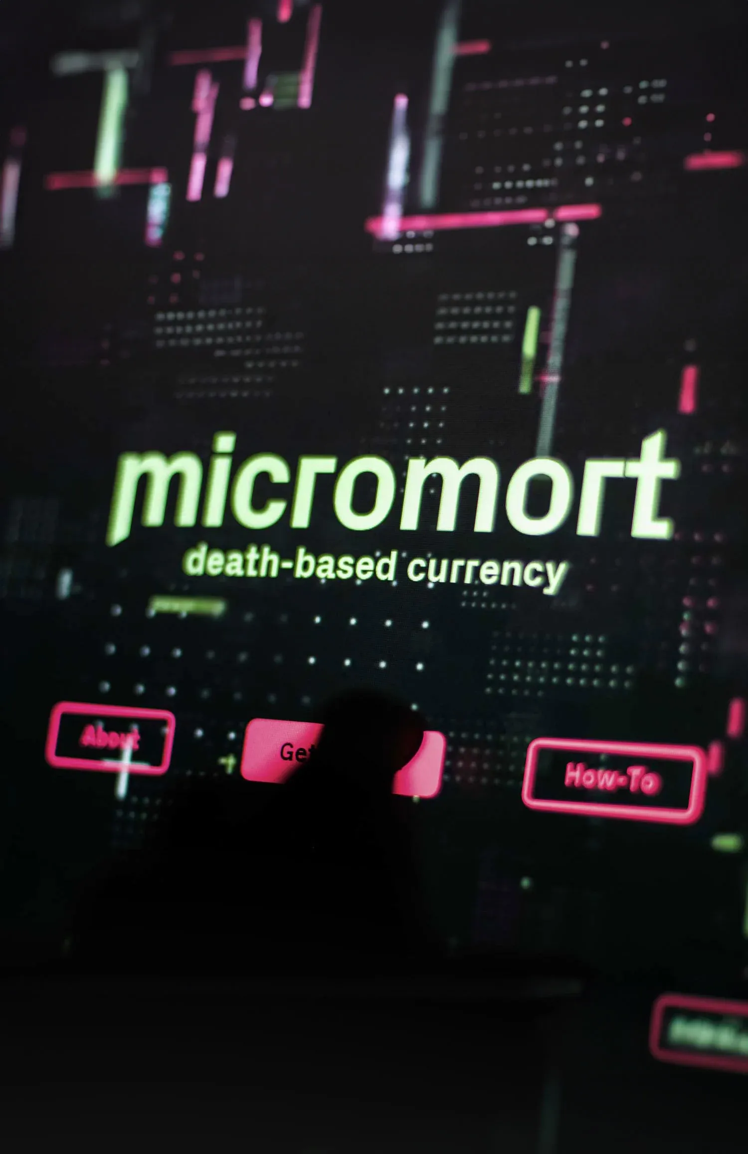Interactive touchscreen monitor showing Micromort homepage | Carlotta Bacchini