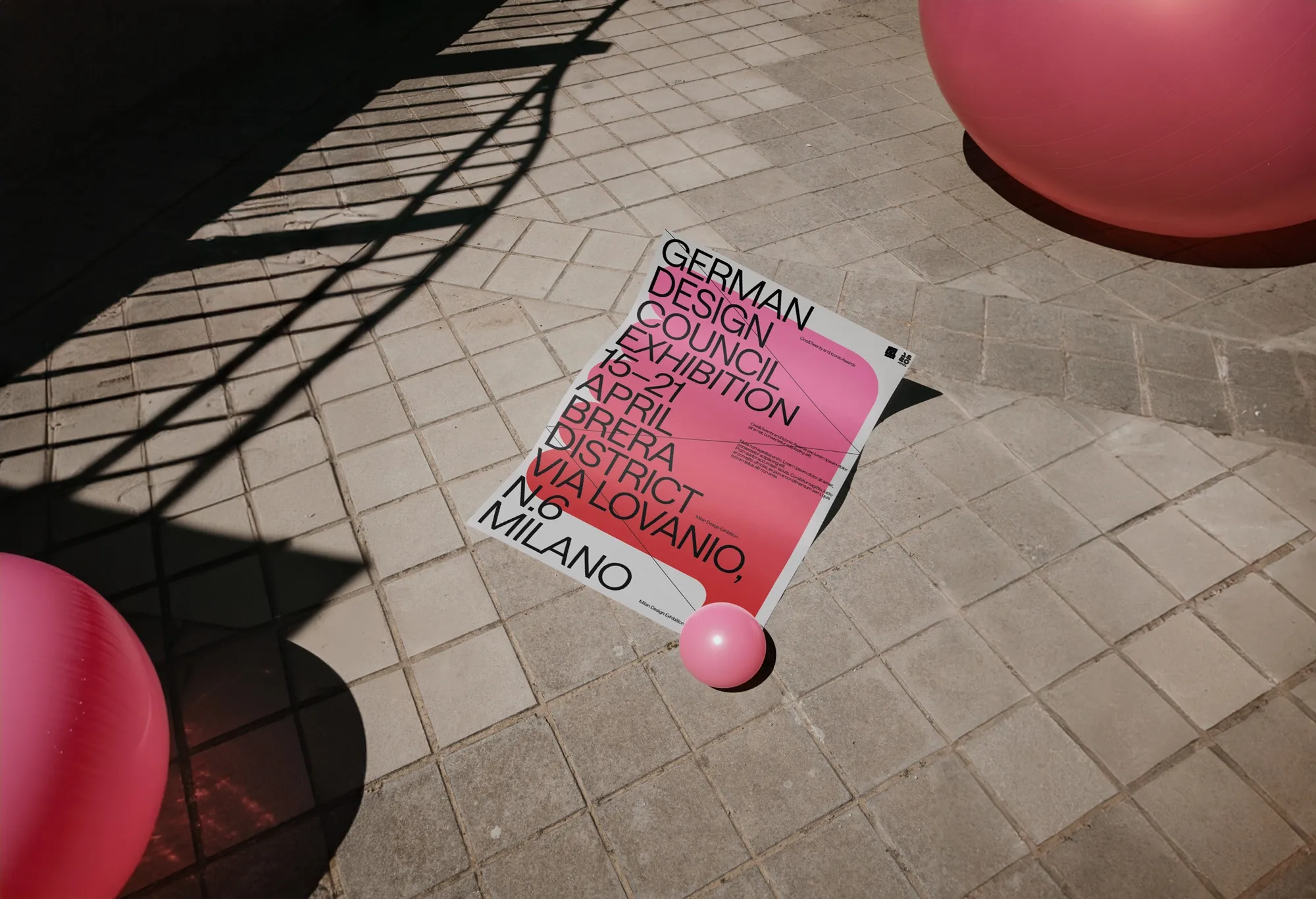 Printed poster on pavement beside inflatable balloon for one&twenty exhibition by German Design Council in Brera, Milan | Carlotta Bacchini